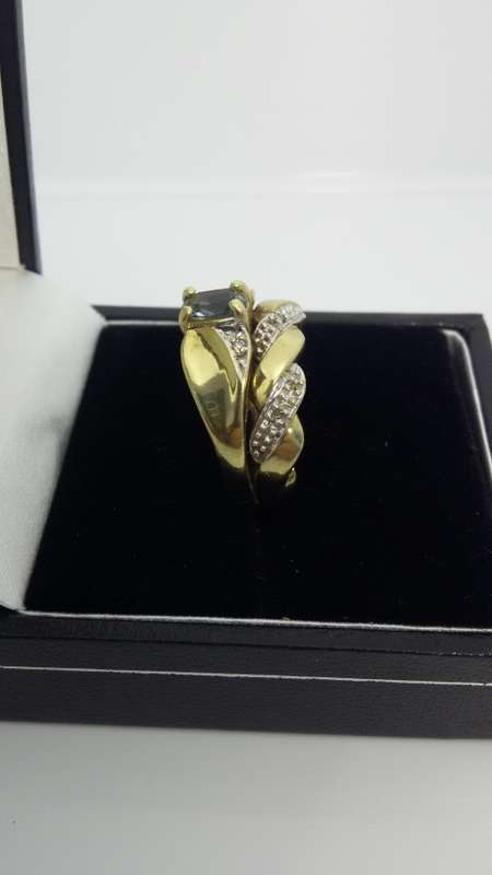 9ct Gold Light blue Topaz double band